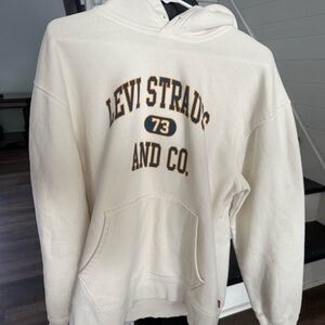 Levi's Cream Crewneck with Navy and Gold Varsity Logo